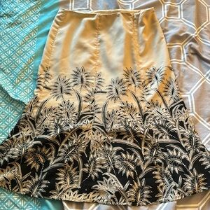 Jones wear floral black and tan skirt.